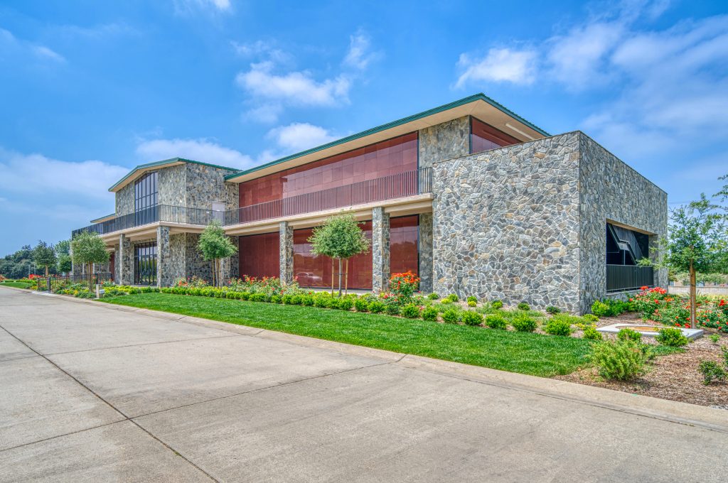 Exterior view of newly constructed mausoleum with polished stone façade